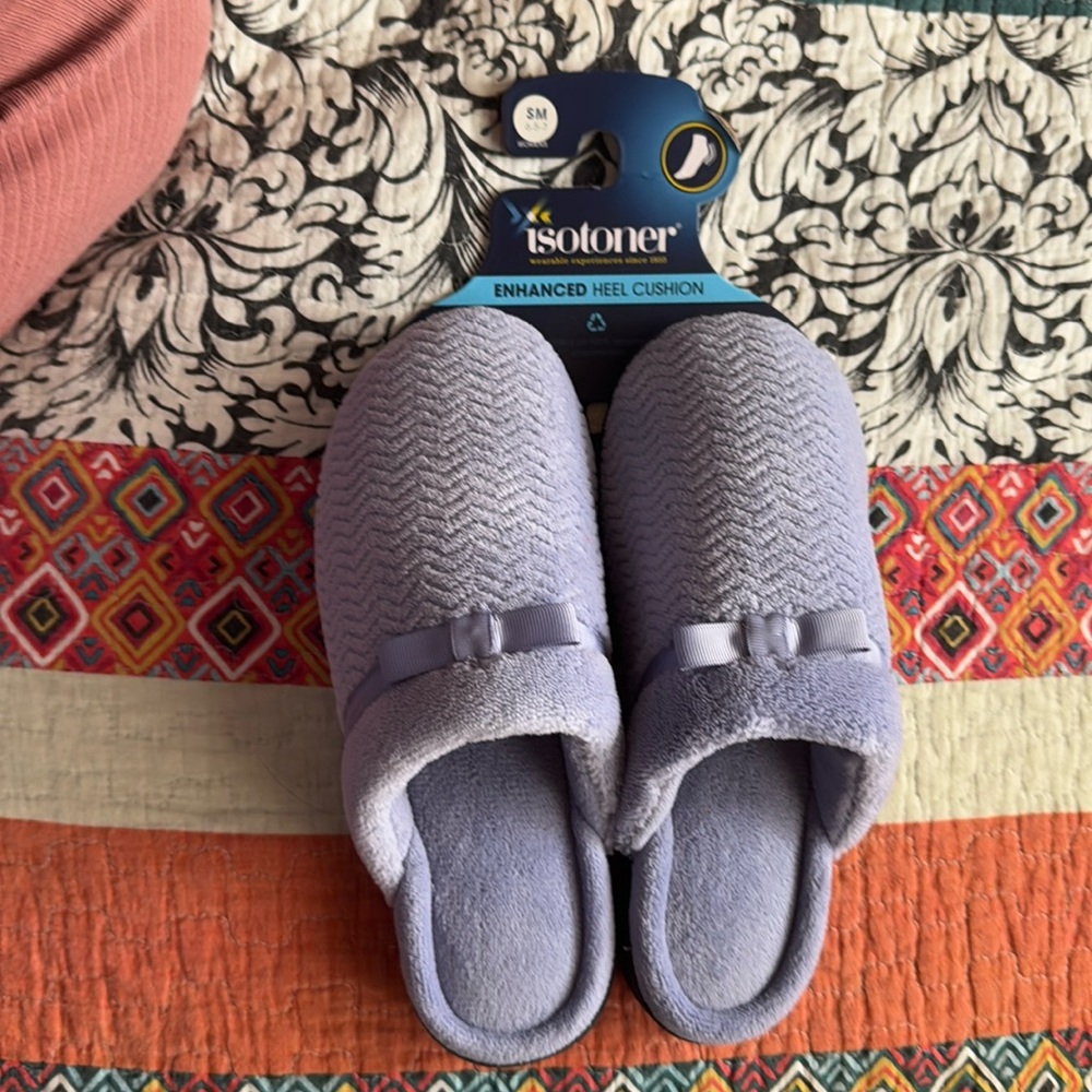 Brand new never worn purple slippers.